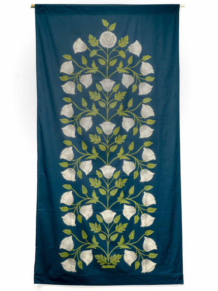 Decorative curtain with floral pattern on a blue background
