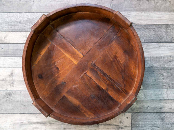 Circular low wooden coffee table from India