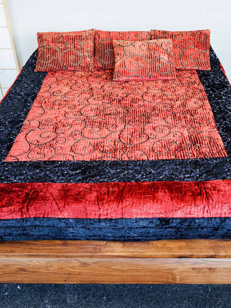 Red and black velvet Turkoman quilt with gold detail