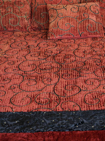 Red and black velvet Turkoman quilt with gold detail