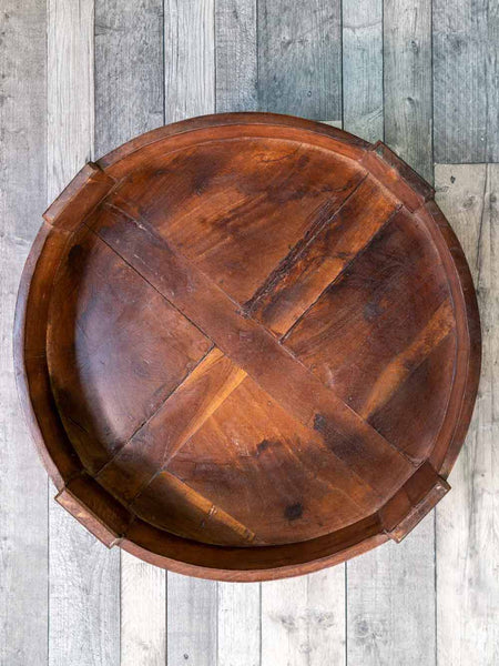 Circular low wooden coffee table from India