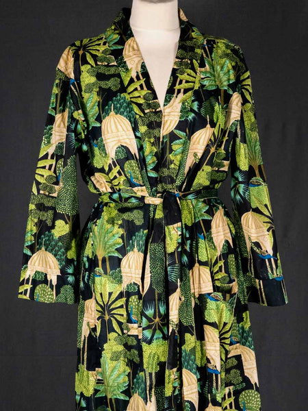 Robe with a tropical leaf pattern on a black background