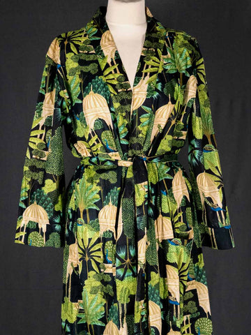 Robe with a tropical leaf pattern on a black background
