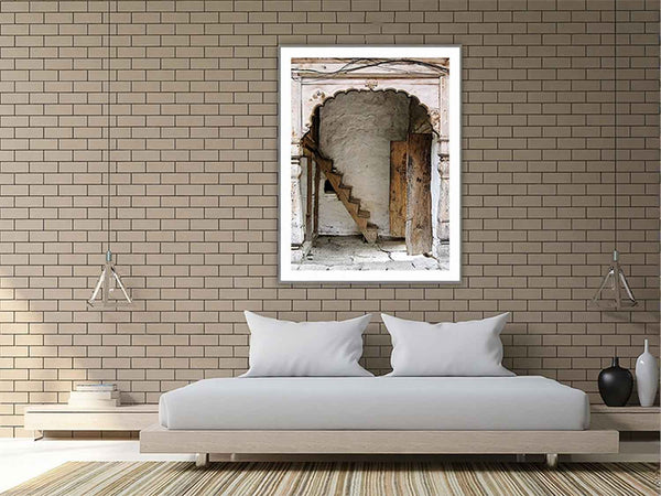 Framed picture of a whitewashed archway in a contemporary bedroom