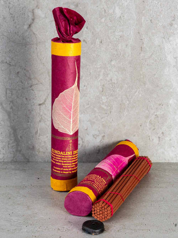 Kundalini Tibetan Incense in a dark red tube
