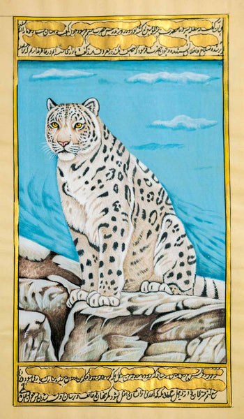 A framed-style artwork showing a snow leopard seated on rocks against a blue sky, with decorative script borders at the top and bottom on a beige background.