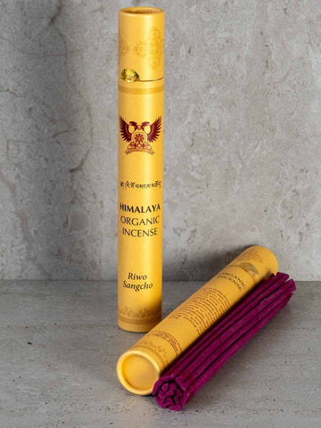 Himalaya Organic Incense with yellow packaging and purple sticks 