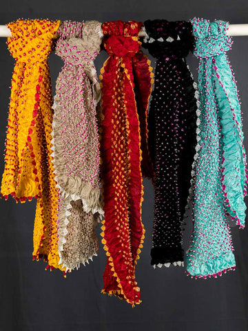 Five colorful scarves of different patterns 