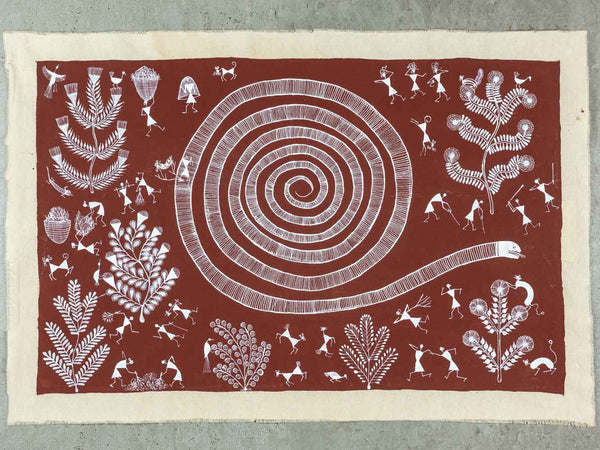 Textile with white spiral design and various patterns on a red background