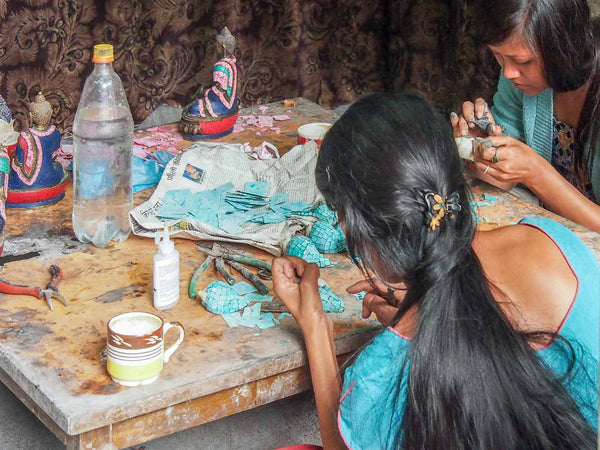 Women making turquoise inlay 
