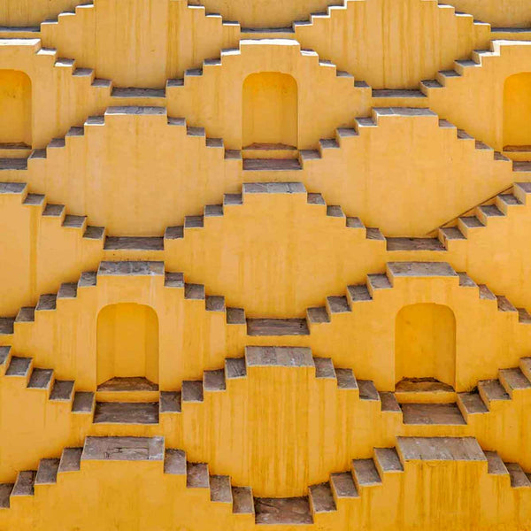 Yellow geometric pattern with steps and arches