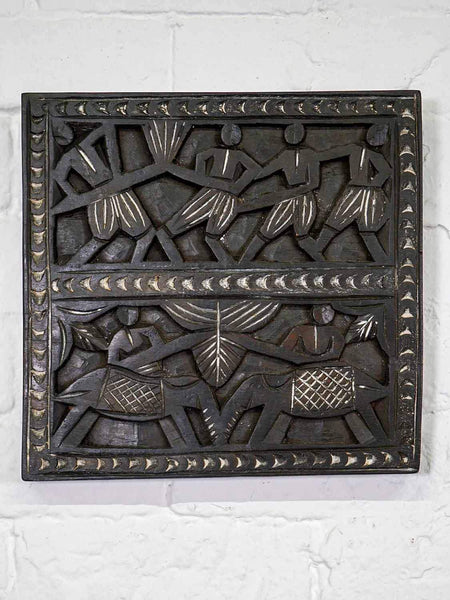 Carved Wooden Panel with Tribal Carvings
