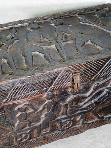 Small wooden Indian chest with tribal carvings