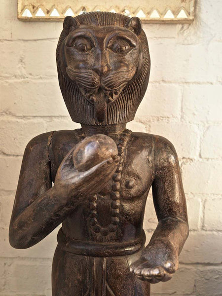 Man with Lion Head Sculpture